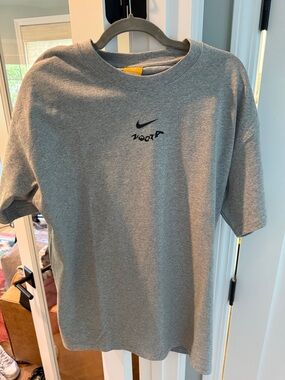 Nocta Yasuke Nike Gray Crewneck Tee with Black Swoosh